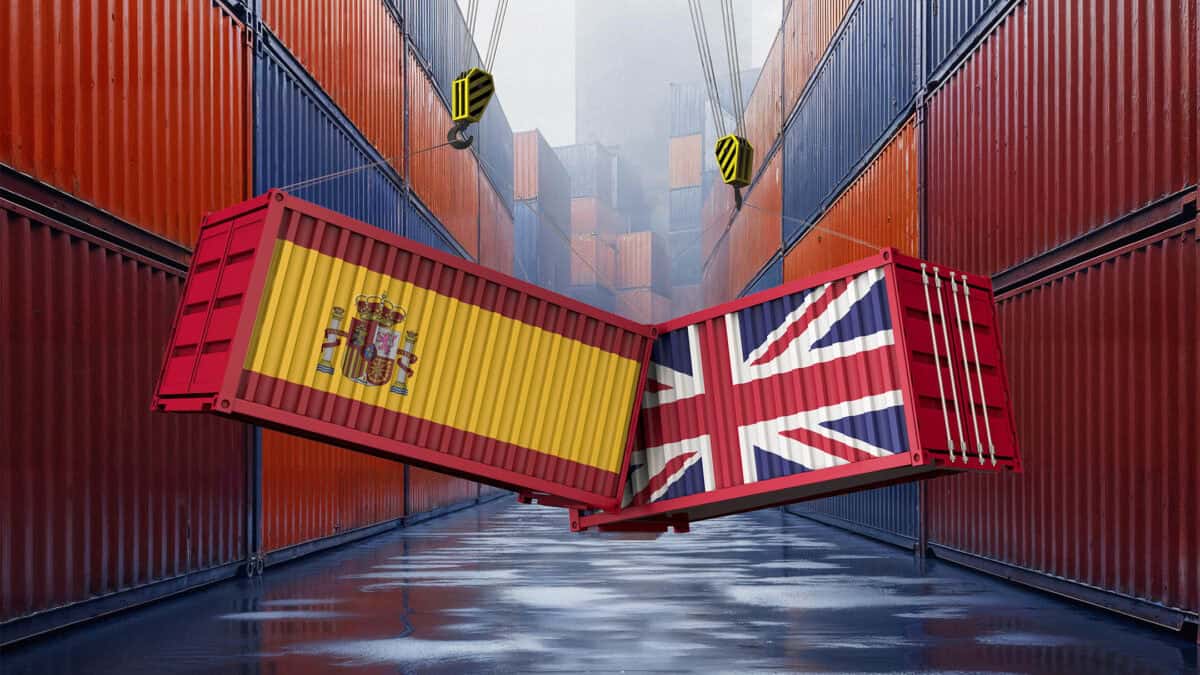Spain and UK shipping containers next to eachother