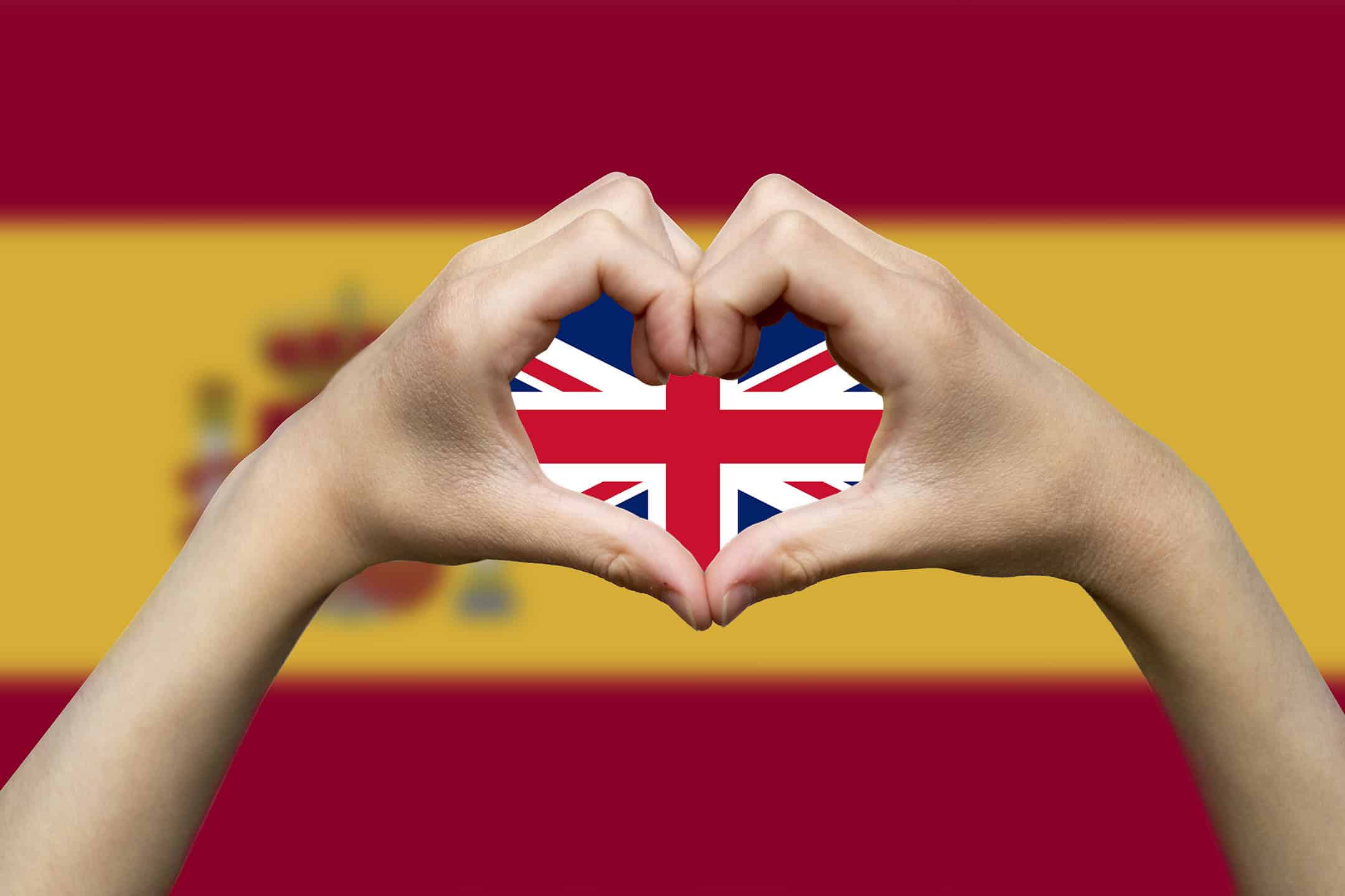 Relocating Back to the UK? Here’s What to Know Before Selling Your Spanish Property 1 spain-flag-with-two-hands-heart-shape-hand-heart-love-sign-with Union Jack in the center.
